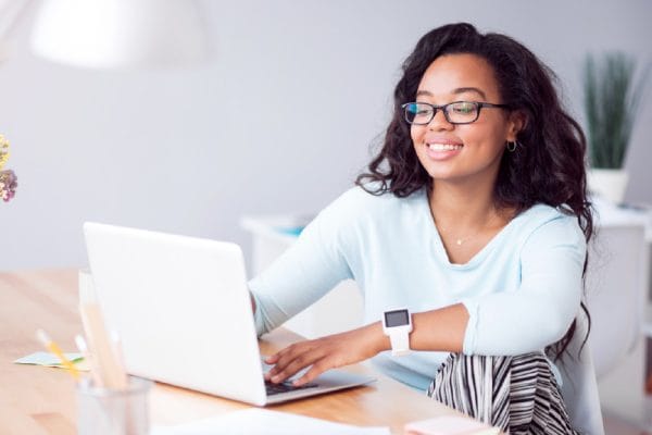 Adult matric physical science student studying online with laptop. Education and e-learning concept.